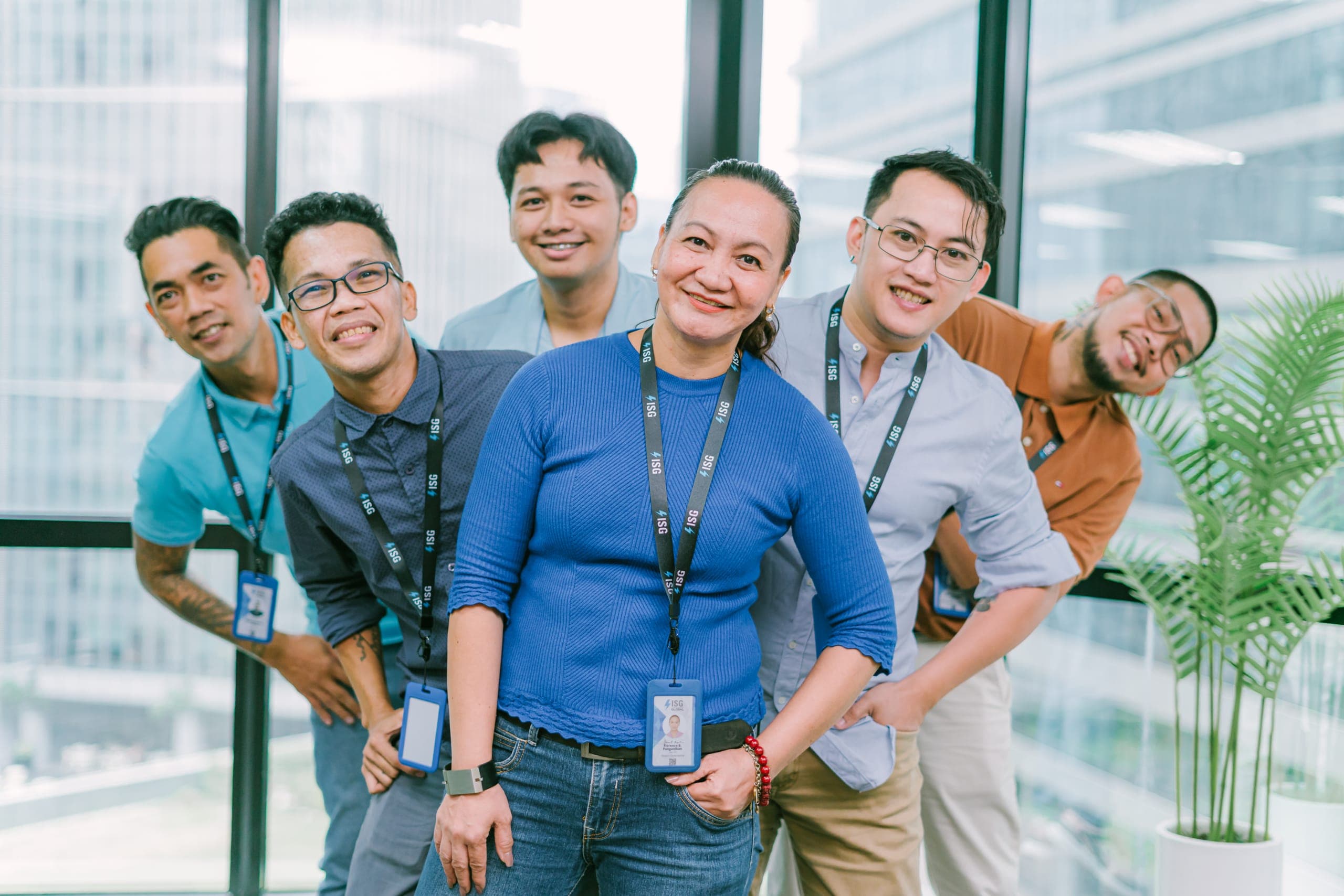 ISG team at the Manila office, floor-to-ceiling windows